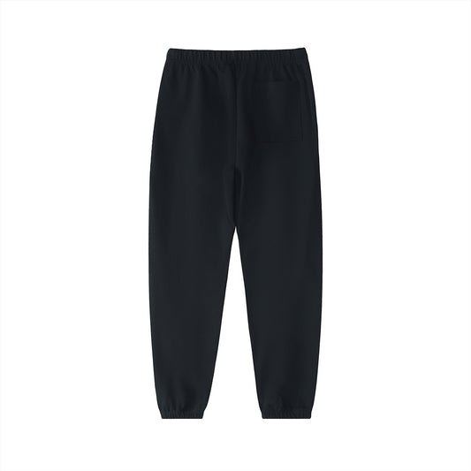 Don Chevere black heavyweight cotton sweatpants with a mid-waist and drawstring. Casual, sporty style.