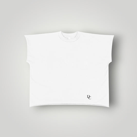 Don Chevere white 100% cotton non-shrink raw edge sleeveless tee with drop shoulder and round neck.