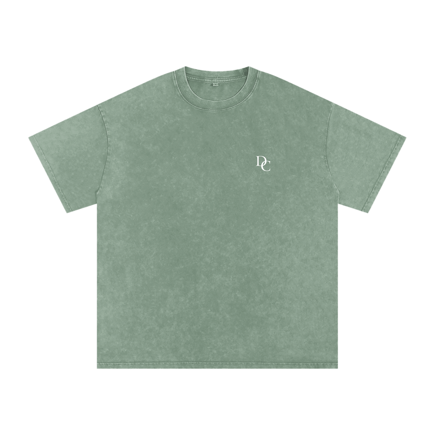 Don Chevere Asphalt Oversized Essential Tee, a washed green 100% cotton t-shirt with a small white DC logo on the chest.