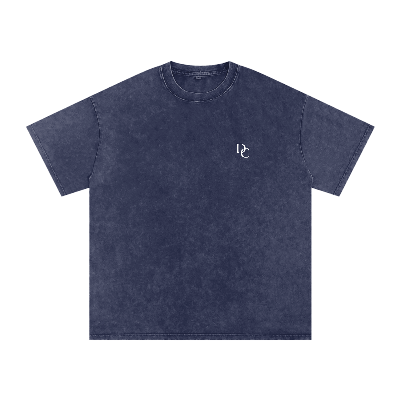 Don Chevere Asphalt Oversized Essential Tee, a washed navy blue 100% cotton t-shirt with a relaxed fit and small white DC logo on the left chest.