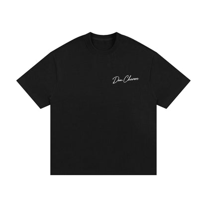 Don Chevere black 100% cotton oversized heavy tee with short sleeves and a crew neck.