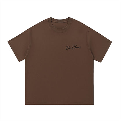 Don Chevere brown 100% cotton unisex short sleeve t-shirt with round neck and printed logo on chest.