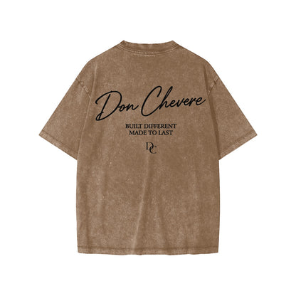 Don Chevere brown washed cotton short sleeve kids' tee with black text graphic on back.