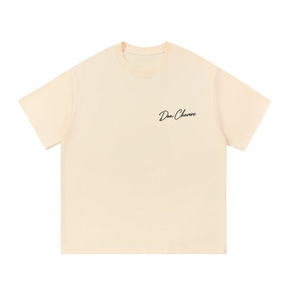 Don Chevere cream 100% cotton unisex short sleeve t-shirt with round neck and printed logo on chest.