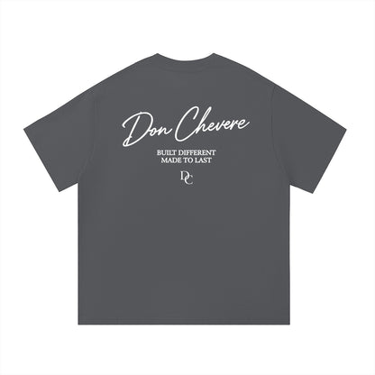 Don Chevere white graphic print on dark grey 100% cotton unisex t-shirt with short sleeves and round neck.