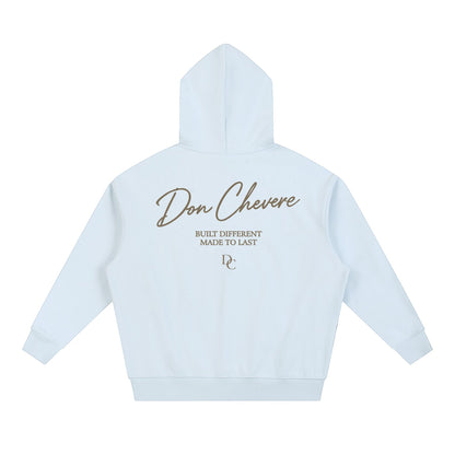 Don Chevere light blue cotton blend drop-shoulder hoodie with script logo and text "BUILT DIFFERENT MADE TO LAST" on back.