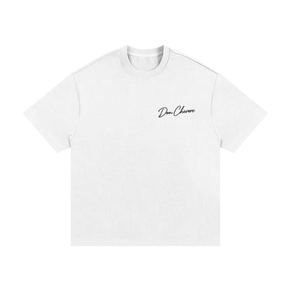 Don Chevere Essential Oversized Heavy Tee in black, made of 100% cotton with a relaxed fit and short sleeves.