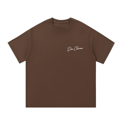 Don Chevere Essential Standard Tee in brown 100% cotton with a white embroidered logo on the chest. Short sleeves and crew neck.