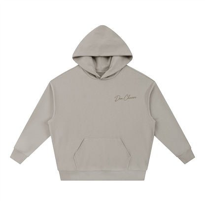 Don Chevere Signature Heavy Drop-Shoulder Hoodie in light grey, made from a cotton-polyester blend with a hood.