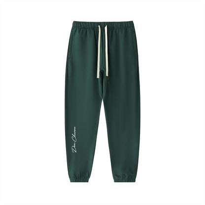 Don Chevere dark green heavyweight cotton sweatpants with drawstring and logo on the left leg.