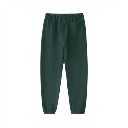 Don Chevere dark green heavyweight cotton sweatpants with a back pocket and elastic cuffs.