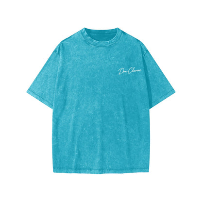 Don Chevere kids' short sleeve tee in washed teal cotton with a round neck and logo on the chest.