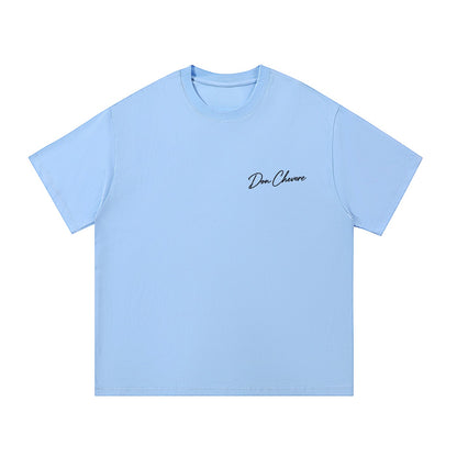 Don Chevere light blue 100% cotton unisex short sleeve t-shirt with round neck and printed logo on chest.