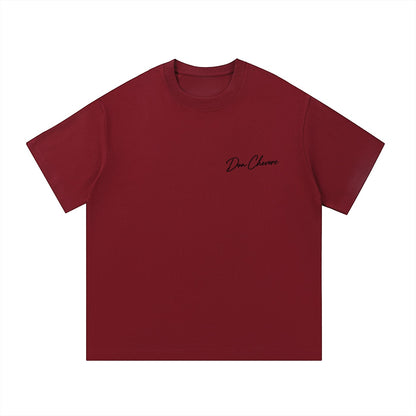 Don Chevere unisex short-sleeve maroon 100% cotton t-shirt with printed logo on chest.