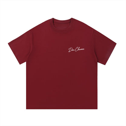 Don Chevere Essential Standard Tee in maroon, made of 100% cotton with a classic crew neck and short sleeves.
