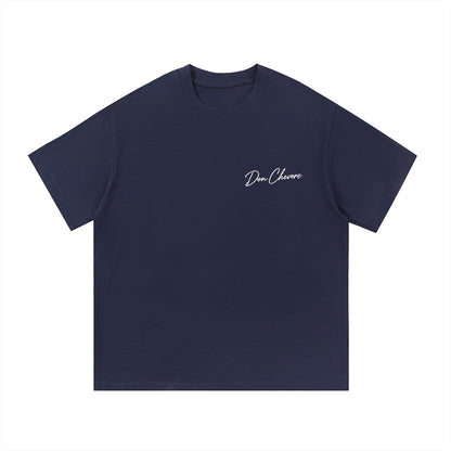 Don Chevere navy blue 100% cotton t-shirt with short sleeves and a round neck. Features embroidered logo on chest.