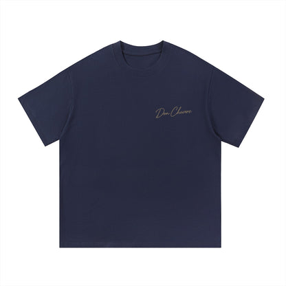 Don Chevere navy blue 100% cotton short sleeve t-shirt with logo on chest. Loose fit, crew neck.