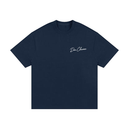 Don Chevere navy blue 100% cotton oversized heavy tee with short sleeves and a crew neck. Features subtle logo on chest.