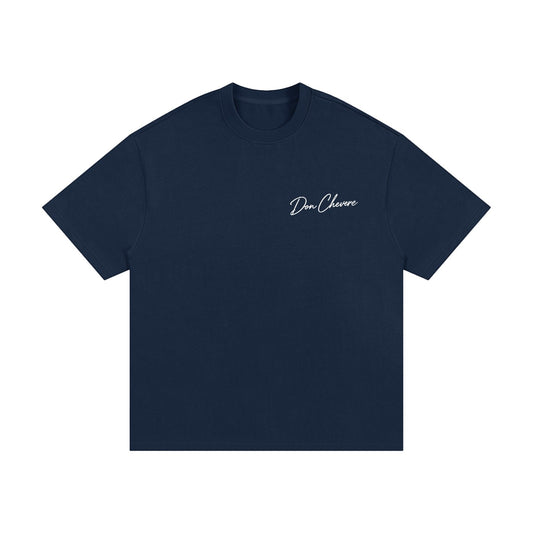 Don Chevere navy blue 100% cotton oversized heavy tee with short sleeves and a crew neck. Features subtle logo on chest.