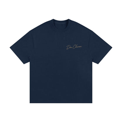 Don Chevere navy blue 100% cotton oversized heavy tee with a round neck and short sleeves. Features a subtle embroidered logo on the left chest.