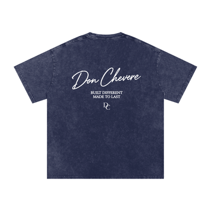 Don Chevere oversized essential tee in dark wash cotton with white text graphic on back.