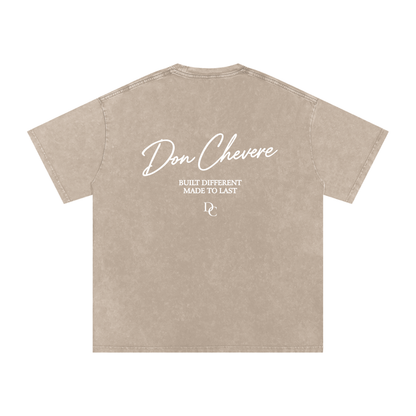 Don Chevere oversized essential tee in tan, 100% cotton with a washed finish and graphic print on back.