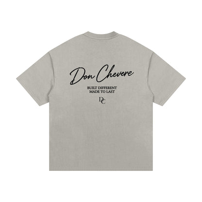 Don Chevere oversized heavy tee in black, made of 100% cotton with a relaxed fit and drop shoulders.