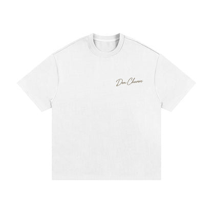 Don Chevere Essential Oversized Heavy Tee in gold, made from 100% cotton with a relaxed fit and short sleeves.