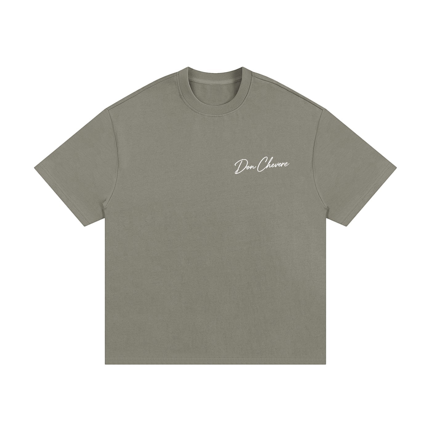 Don Chevere oversized heavy tee in a muted green color. Made of 100% cotton with a crew neck and short sleeves.