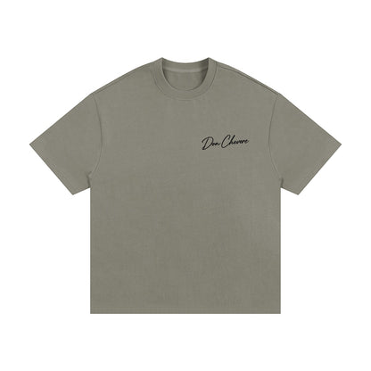 Don Chevere oversized heavy tee in muted green, 100% cotton with a crew neck and short sleeves.