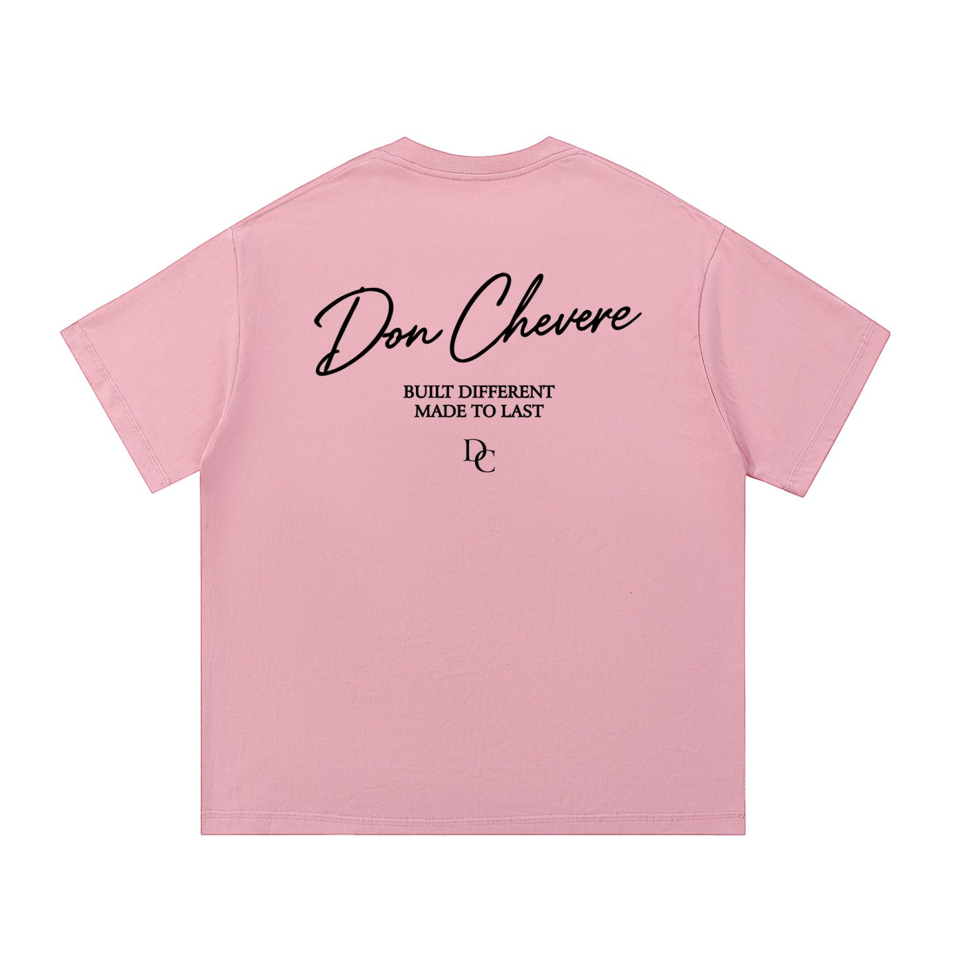 Don Chevere pink 100% cotton unisex short sleeve t-shirt with black text graphic on back.