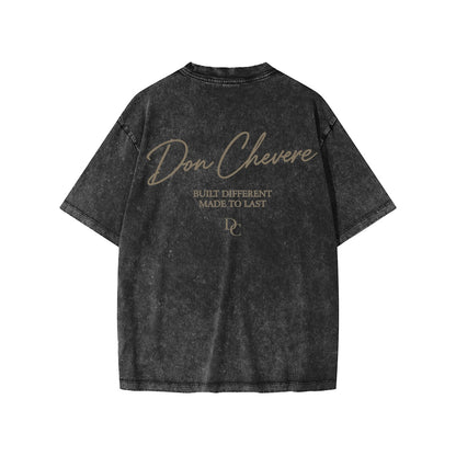 Don Chevere snow washed charcoal grey 100% cotton kids' short sleeve tee with graphic print on back.