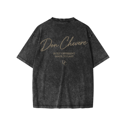 Don Chevere snow washed charcoal grey 100% cotton kids' short sleeve tee with graphic print on back.