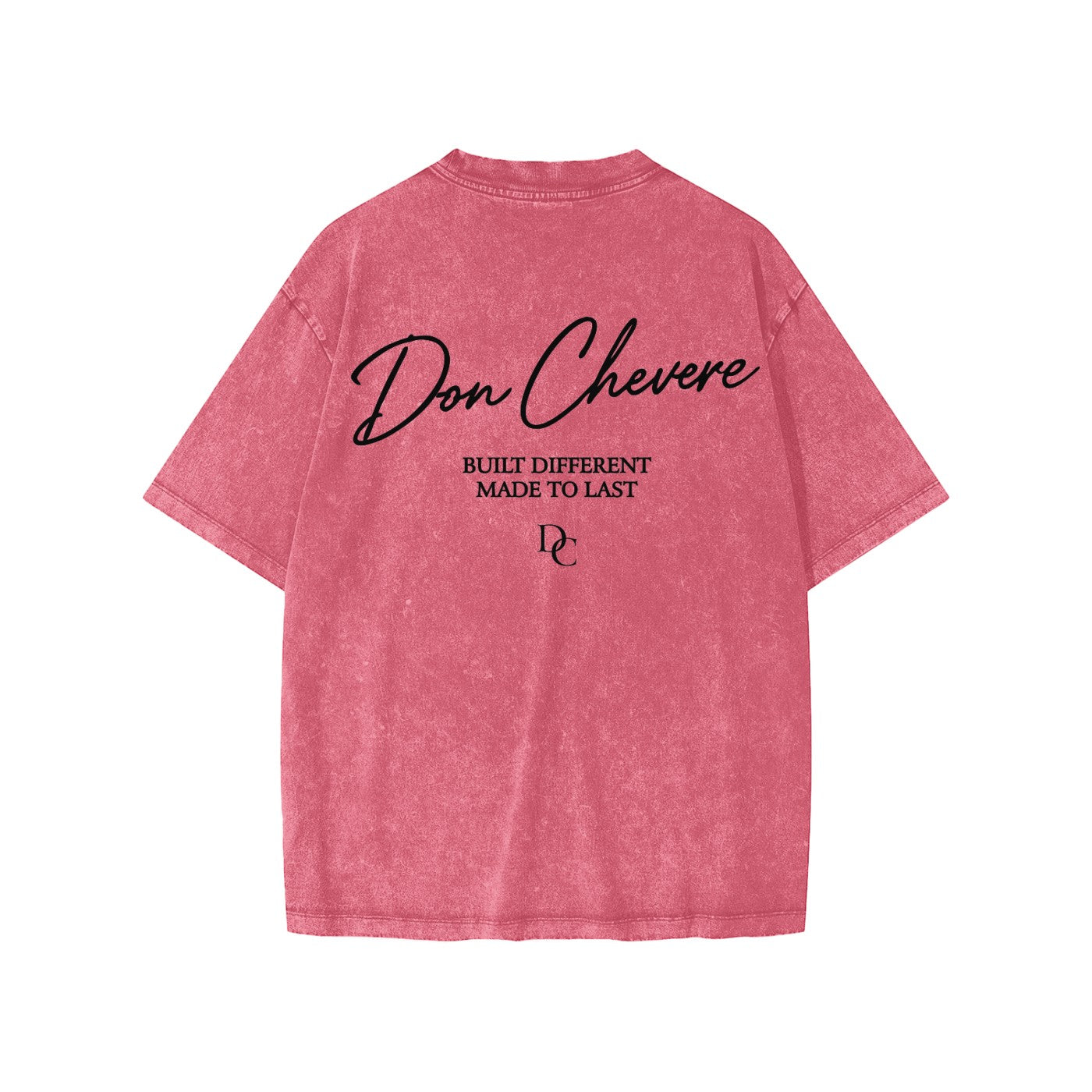 Don Chevere snow washed kids' tee in pink, 100% cotton with black text graphic on back.