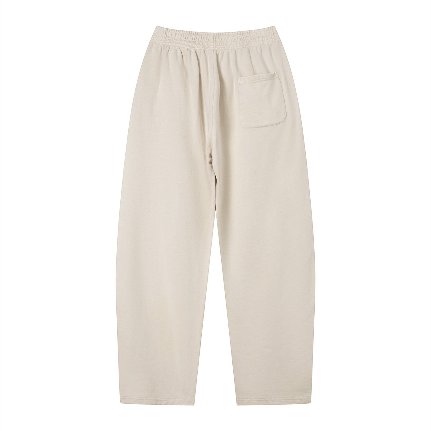 Don Chevere vintage wash loose sweatpants in beige cotton with elastic waist, drawstring, and back pocket.