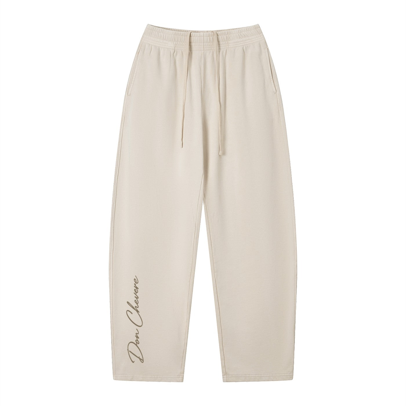 Don Chevere vintage wash loose sweatpants in beige, 100% cotton, with elastic waist, drawstring, and side pockets.