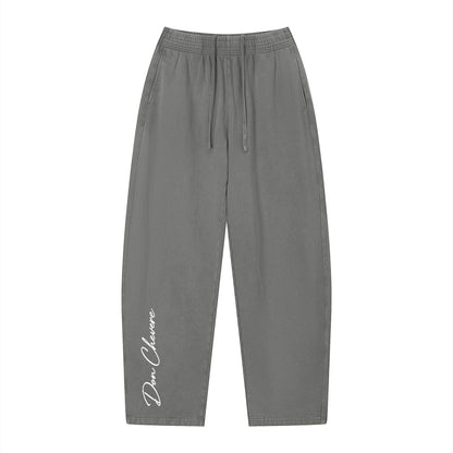Don Chevere vintage wash loose sweatpants in grey 100% cotton with elastic drawstring waist and side pockets.