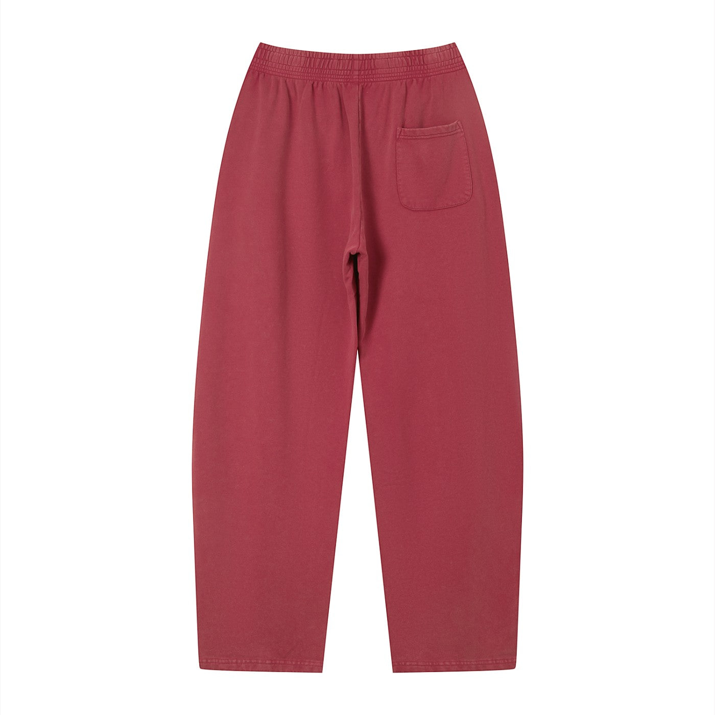 Don Chevere vintage wash loose sweatpants in a dusty rose color, made of 100% cotton with an elastic waistband and a single back pocket.