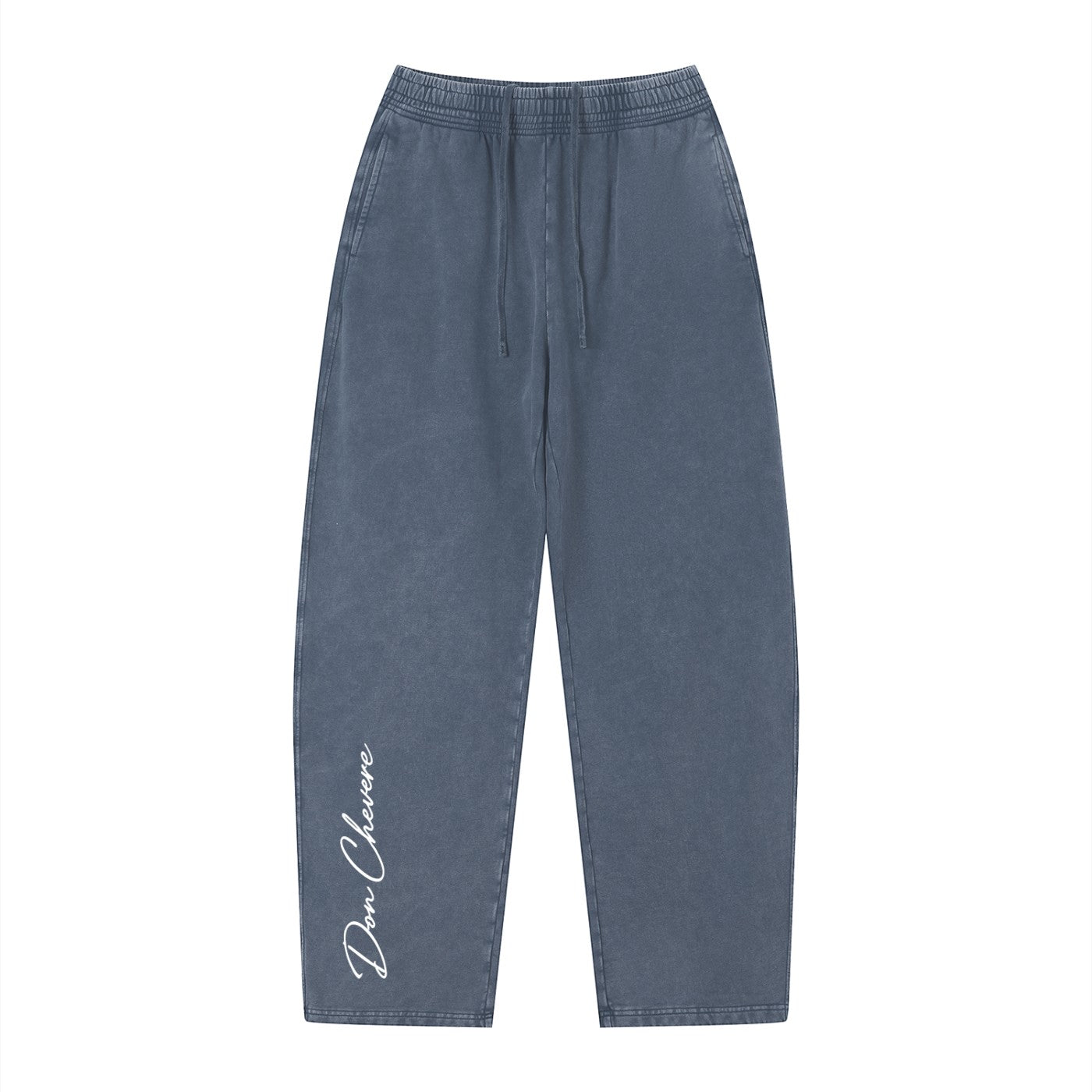Don Chevere vintage wash loose sweatpants in dark blue, made of 100% cotton with an elastic drawstring waist and side pockets.