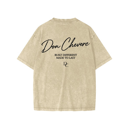 Don Chevere beige washed cotton short sleeve kids' tee with black text graphic
