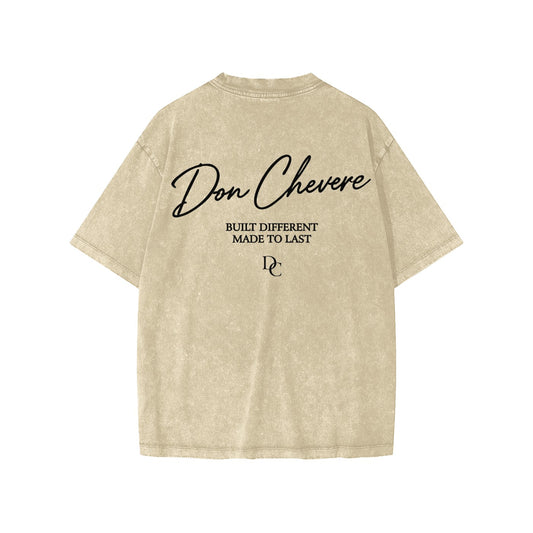 Don Chevere beige washed cotton short sleeve kids' tee with black text graphic