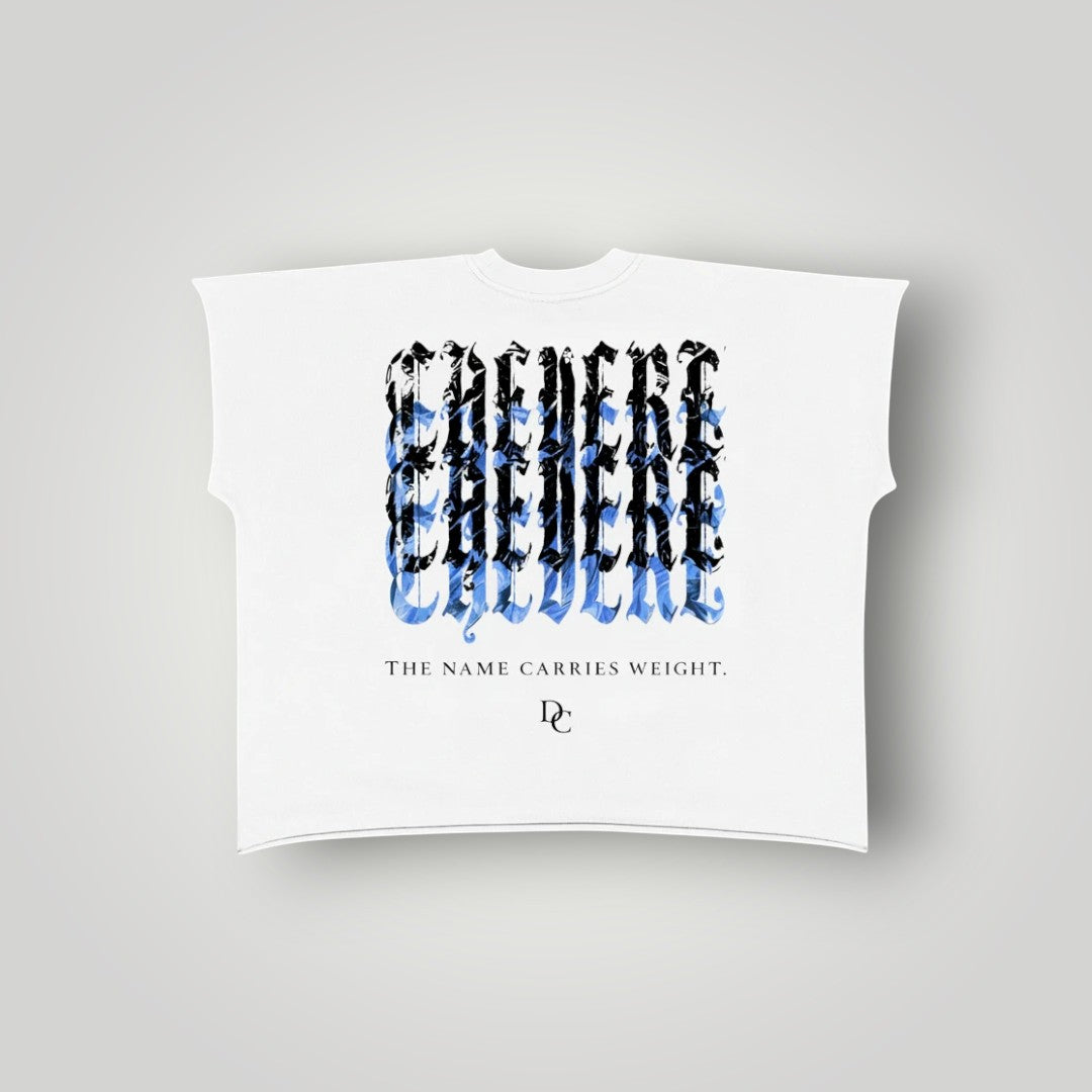 Don Chevere white 100% cotton non-shrink raw edge tee with a graphic print and text "THE NAME CARRIES WEIGHT."