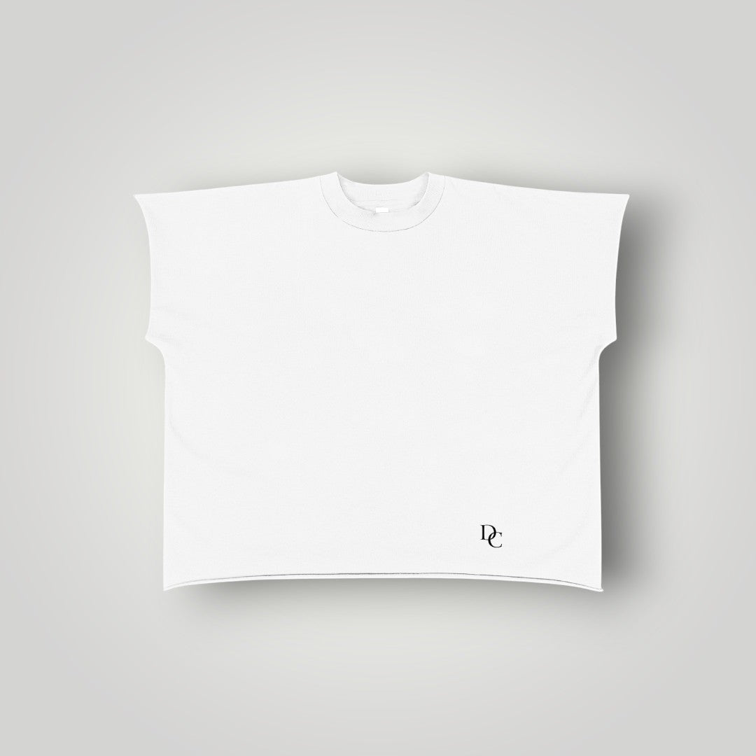 Don Chevere white 100% cotton non-shrink raw edge sleeveless tee with drop shoulder and round neck.