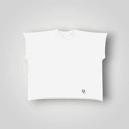 Don Chevere white 100% cotton non-shrink raw edge sleeveless tee with drop shoulder and round neck.